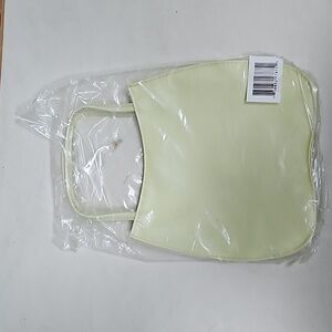 Little light yellow purse with Snap closure.